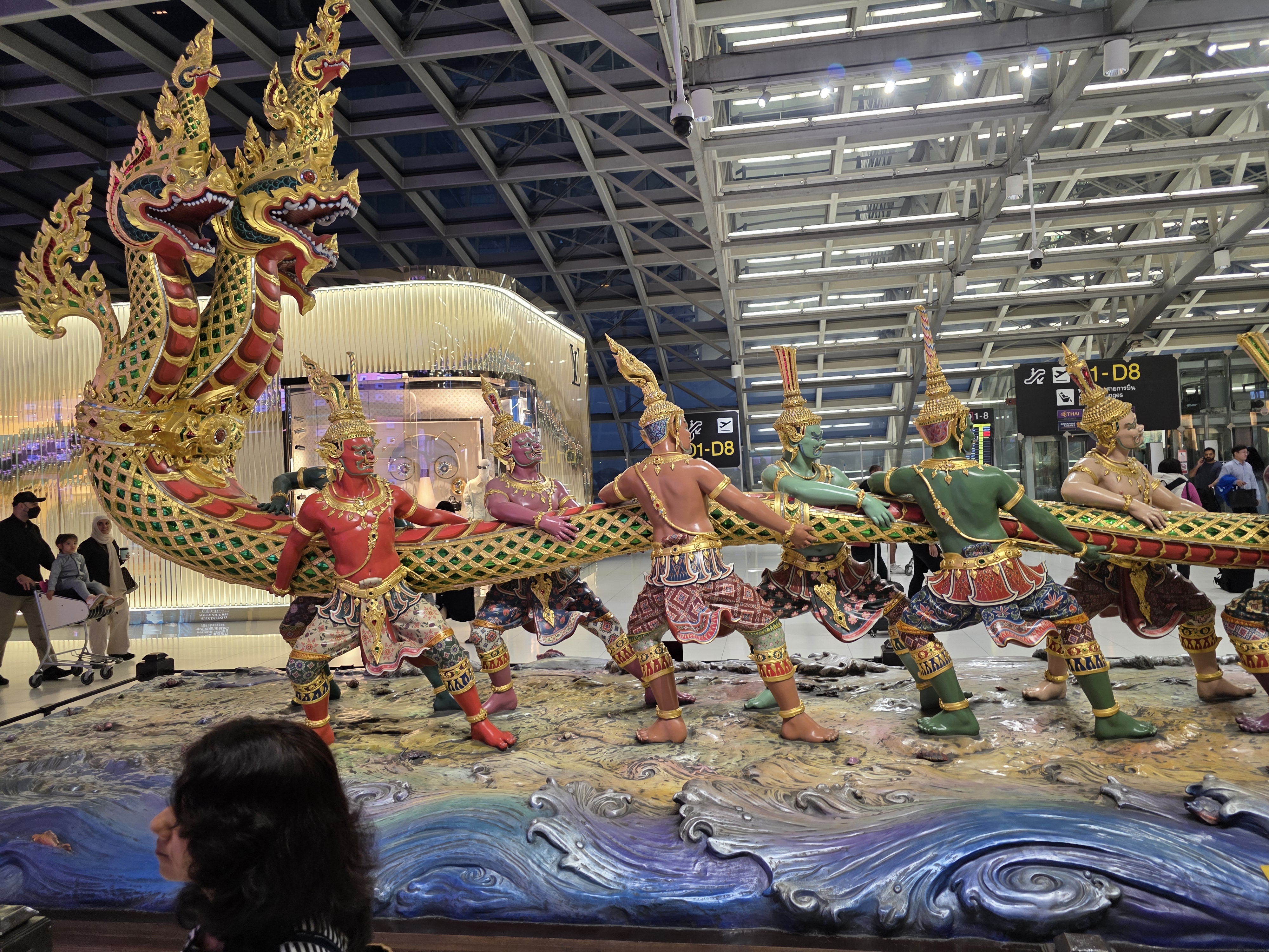 Suvarnabhumi Airport "Churning of the Milk Ocean" sculpture at departure