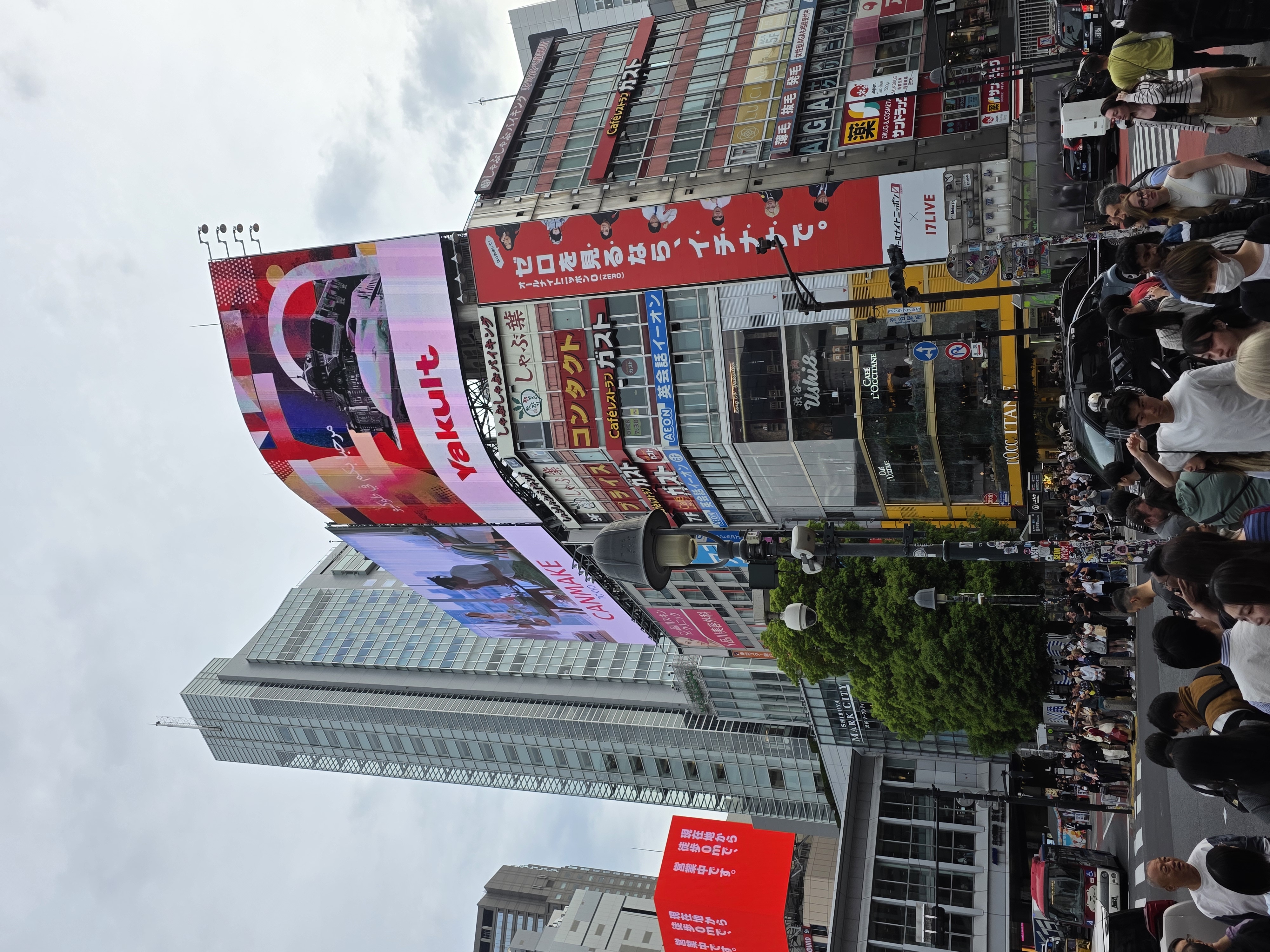 walking towards Shibuya Scramble Crossing