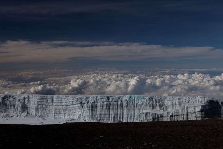 Kilimanjaro glacier at the summit — ancient ice formations, blue sky