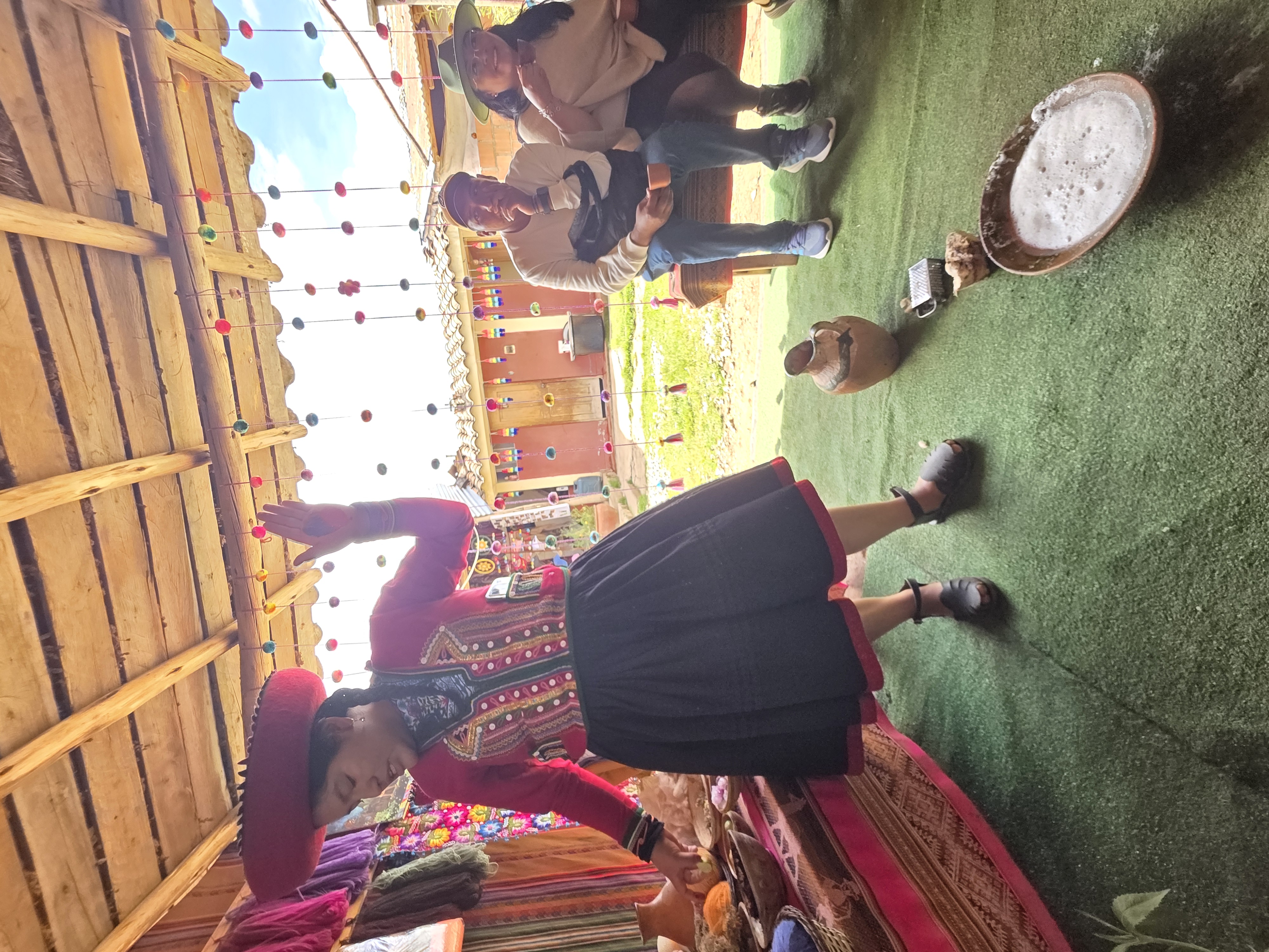 weaving demonstration, traditional dress