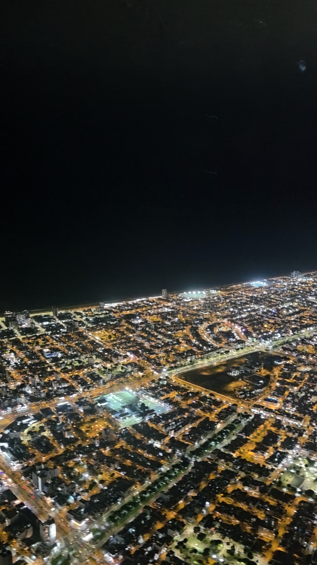 Lima at night, aerial departure shot